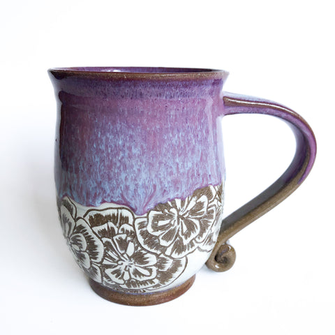 Tasse à anse motif fleurs