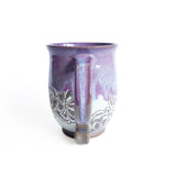 Tasse à anse motif fleurs