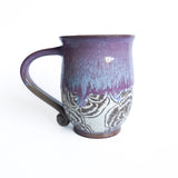 Tasse à anse motif fleurs